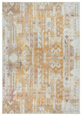 A bohemian style area rug with a geometric pattern in Turkish yellow and gray tones.